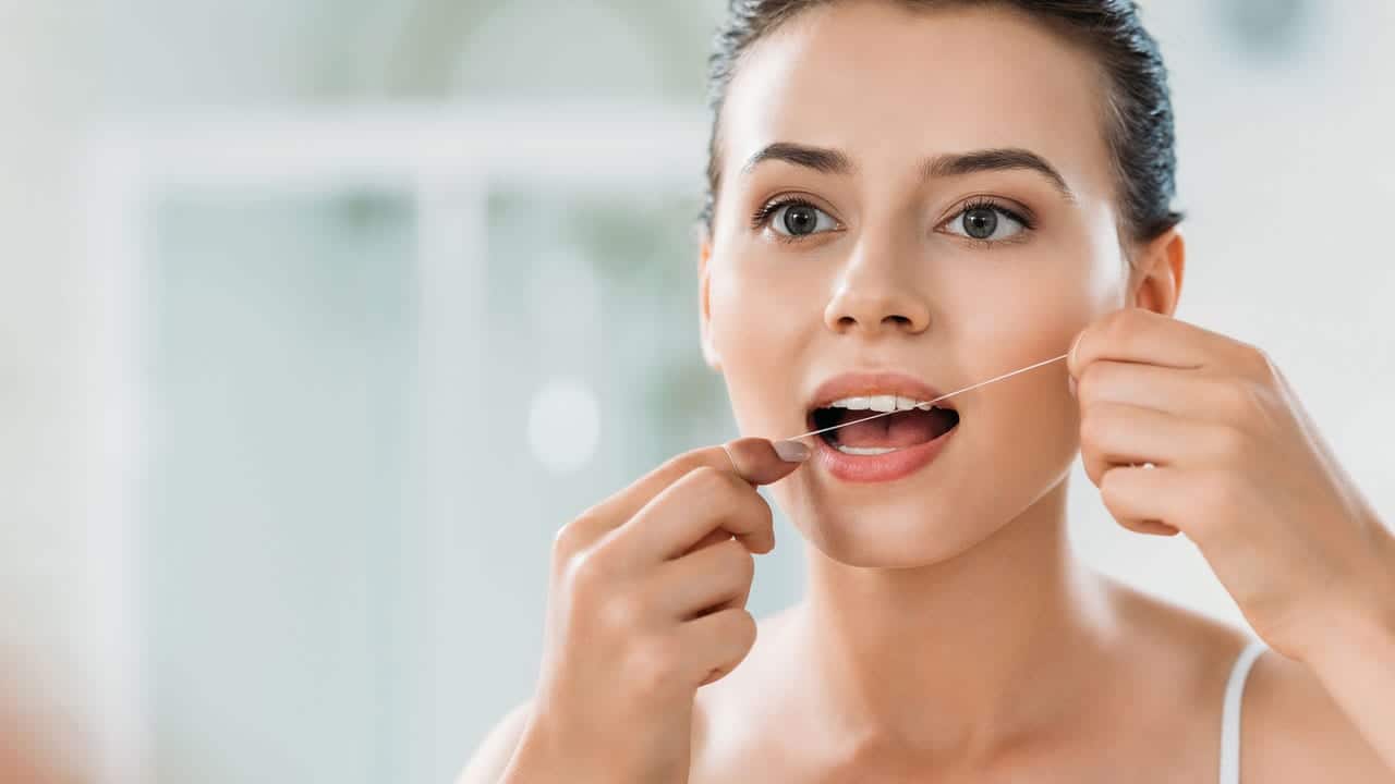 The Link Between Poor Flossing and Gum Disease Reading
